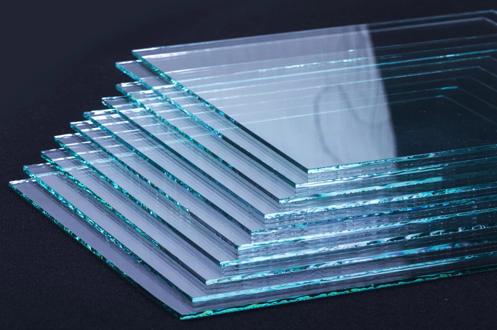 A pile of glasses with interesting lighting that highlighted their reflective and transparent quality as a material.